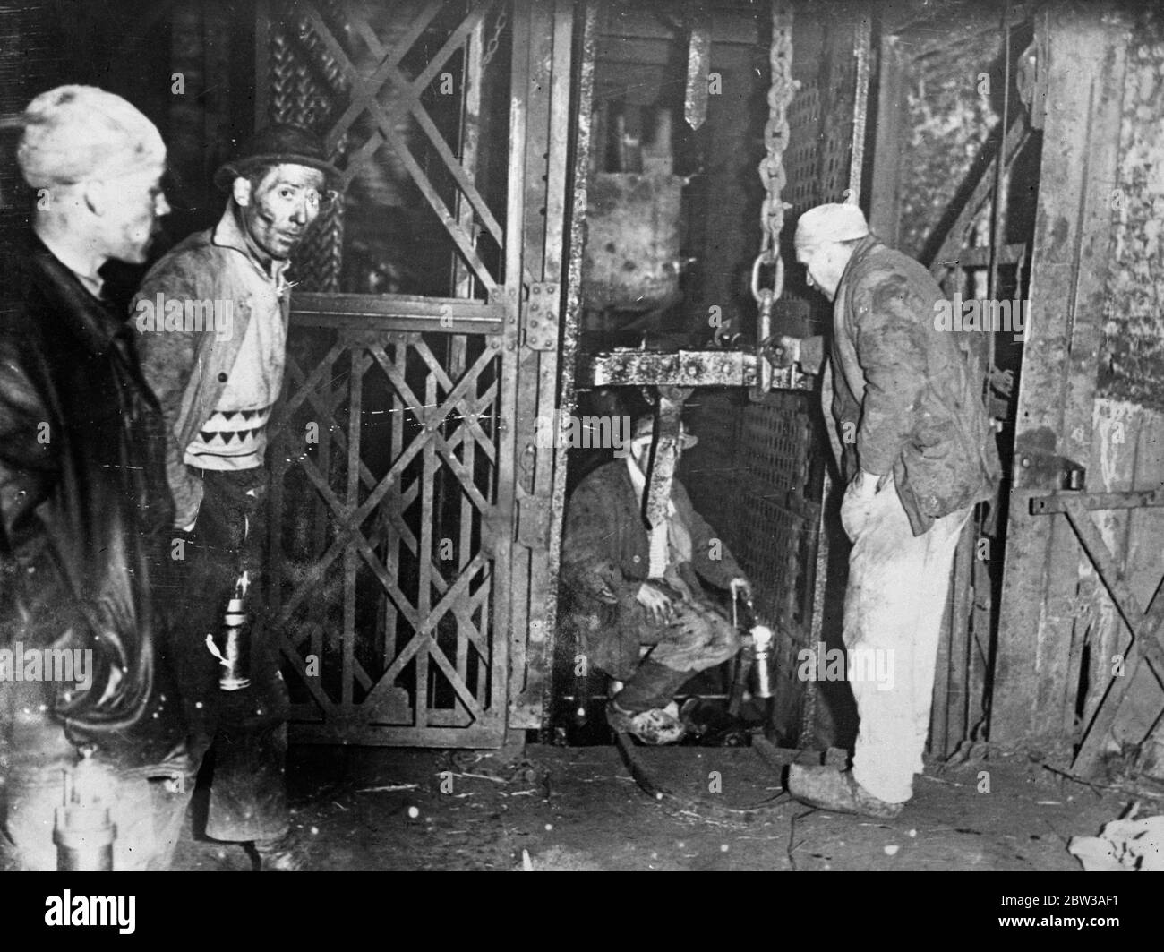 43 perish in Belgian mine disaster . Forty three men entomed when a disastrous explosion occured in a coal mine near Paturages , Belgium . The explosion occured in a gallery 2 , 700 feet underground . After the accident the mine was sealed . Photo shows bringing up a victim of the explosion . 17 May 1934 . Stock Photo