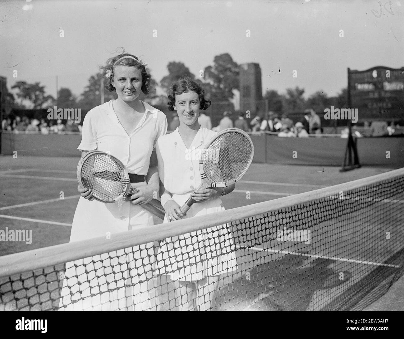 Junior tennis finalists at Wimbledon . The semi finals of the singles of the junior tennis championships were played at Wimbledon . Photo shows the two finalists in the girls ' singles , Miss Rowe ( left ) and Miss Platt . 14 September 1934 Stock Photo