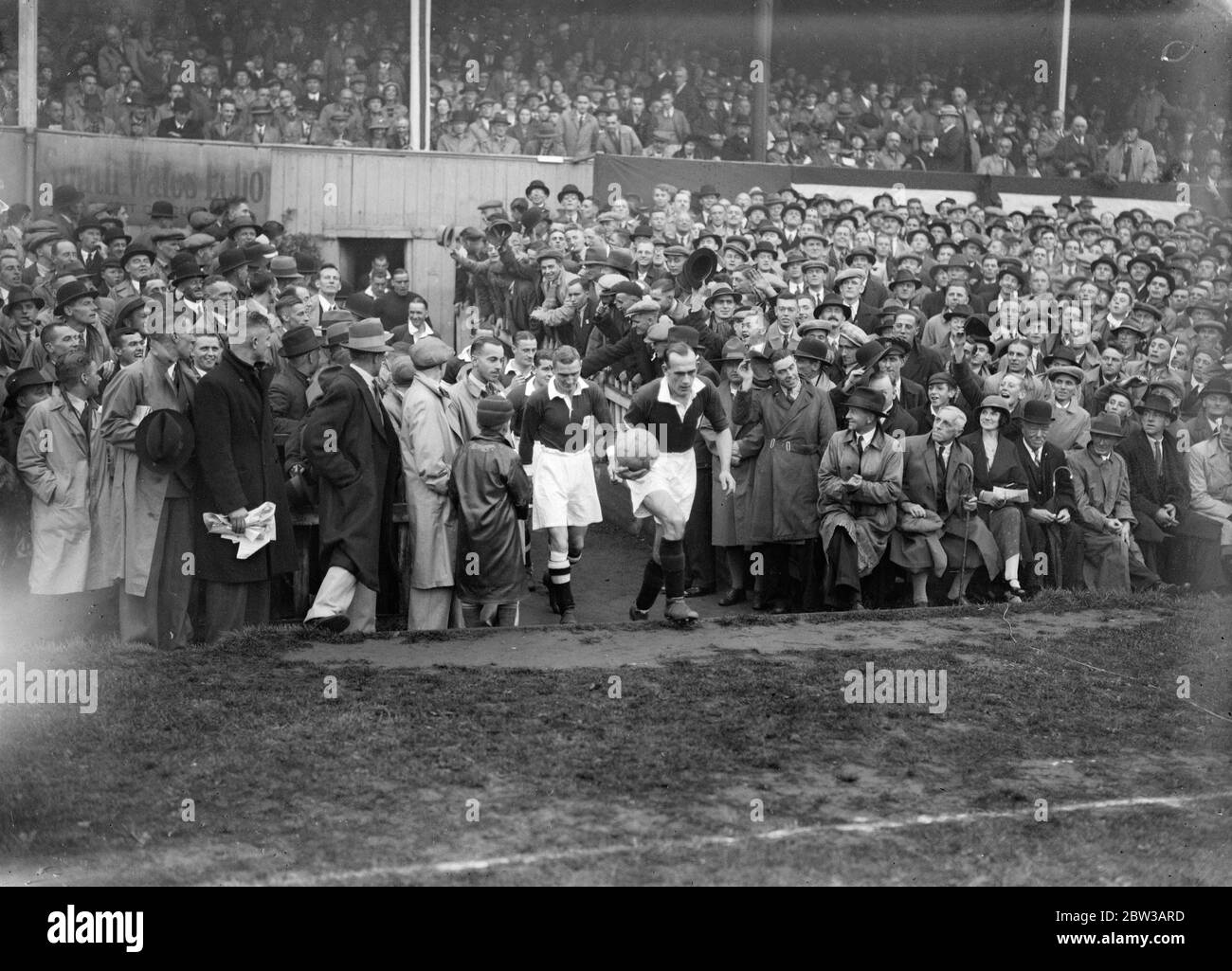 Ninian Park Football ground , Cardiff . England versus Wales . Welsh team coming out onto the field . 29 September 1934 Stock Photo