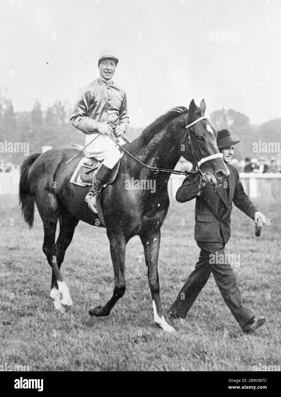 Brantome , France 's unbeaten 3 year old racehorse with Rouillon up on saddle . 7 October 1934 . Stock Photo