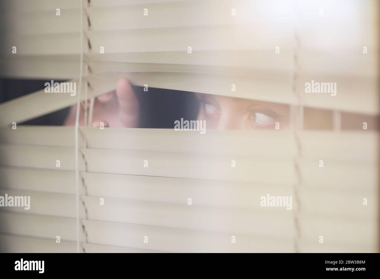 Spy looking through blinds hires stock photography and images Alamy