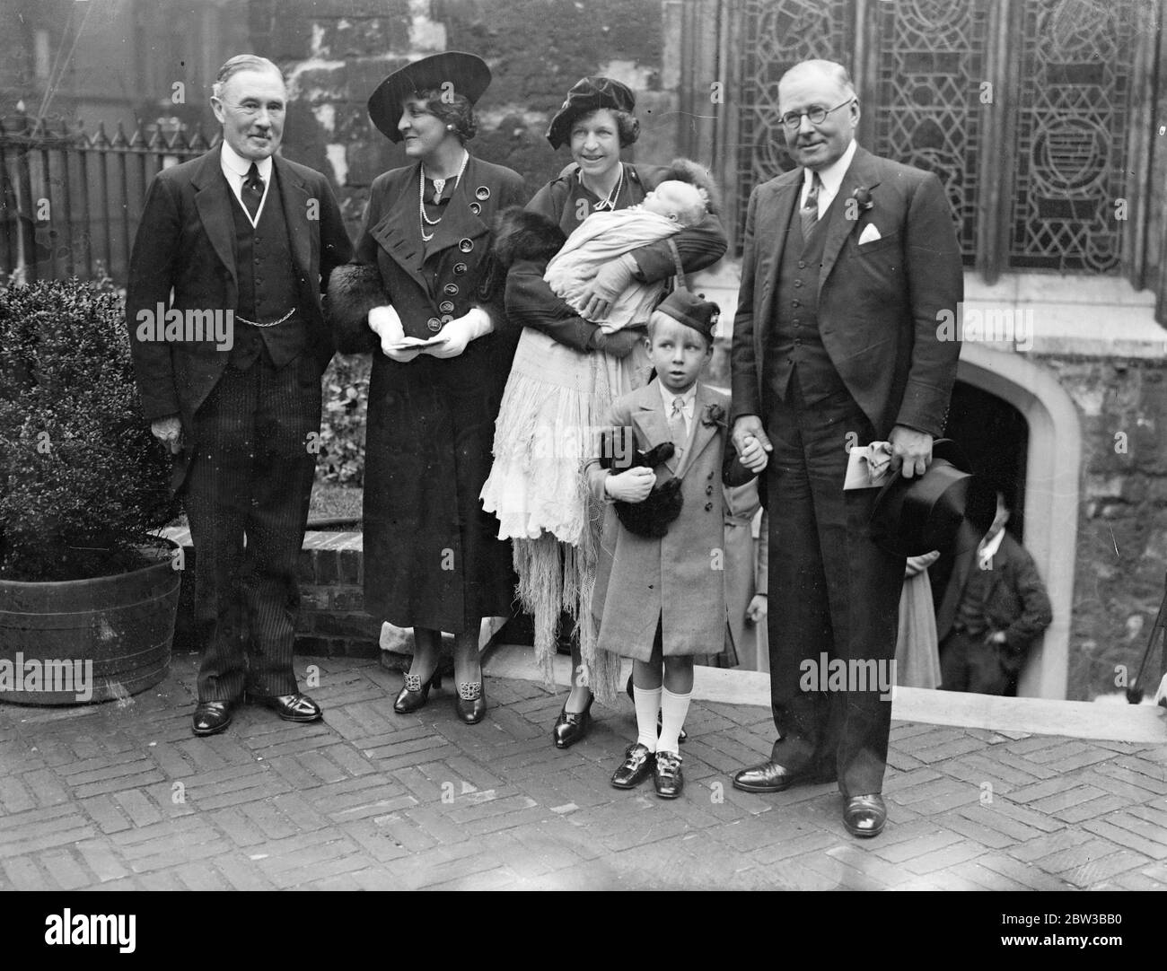 The infant baby of Mr J C C Davidson , Chancellor of Duchy of Lancaster , christened . 11 October 1934 Stock Photo