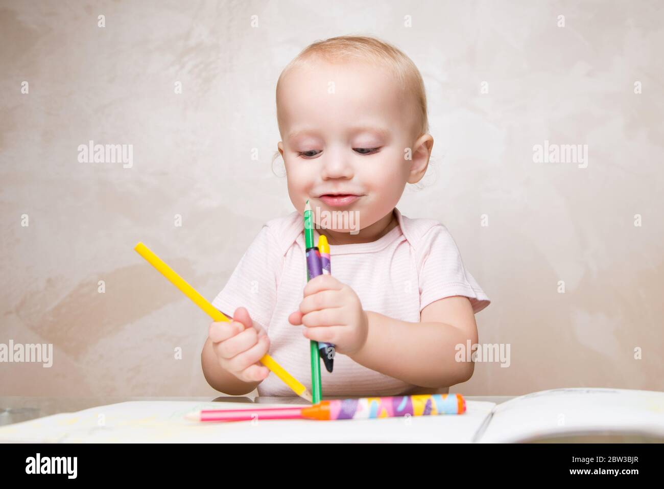 Baby crayons hi-res stock photography and images - Alamy