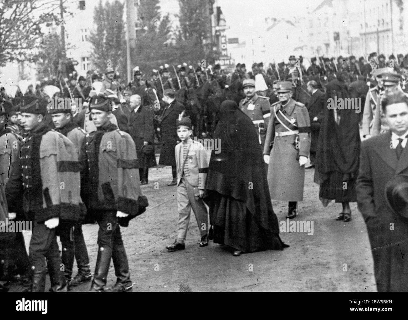 King Peter and his mother , Queen Maria of Yugoslavia , at funeral of his father , King Alexander of Yugoslavia . 19 October 1934 . Stock Photo