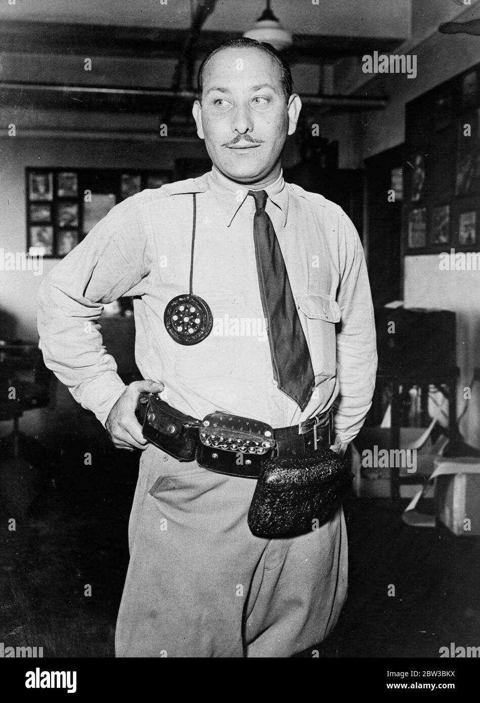 Mr Sol H Levy wearing his invention , a five valve radio receiver . 19 October 1934 Stock Photo