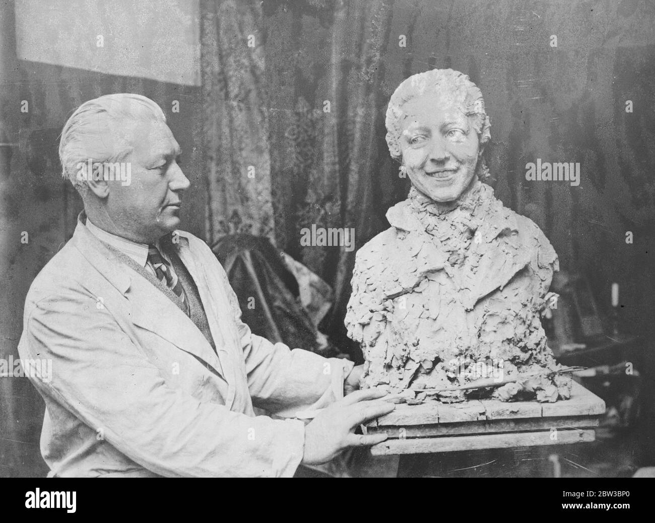 Mrs Mollison modelled in clay by famous American sculptor in Paris , Mr George Cobler . 23 October 1934 Stock Photo