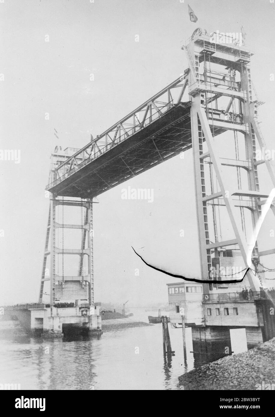 Europes biggest lifting bridge opened over the River Elbe in the port of Hamburg , Germany . 25 March 1934 Stock Photo