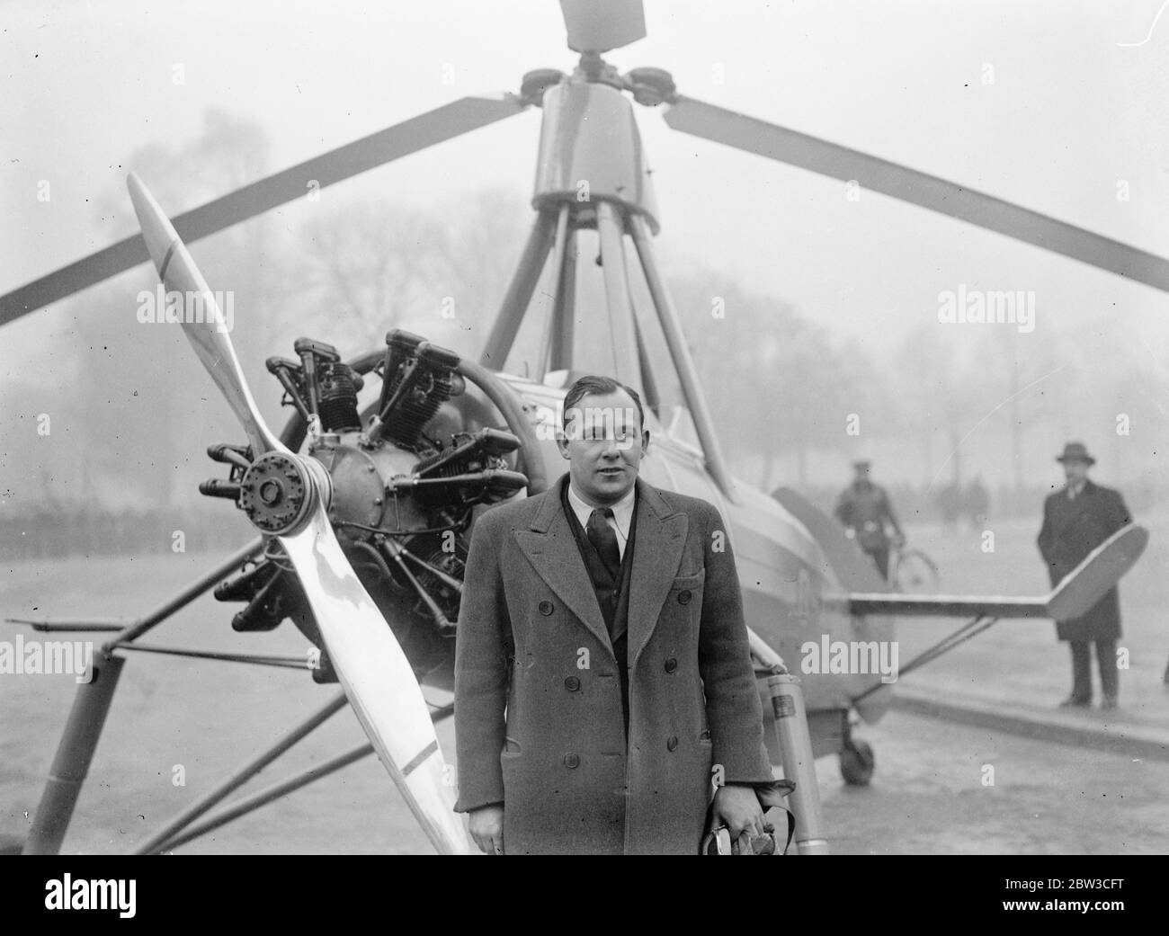 British autogiro lands in Paris street outside the Grand Palais where the 14th Salon De L'Aviation ( trade show ) is being held . 23 November 1934 Stock Photo