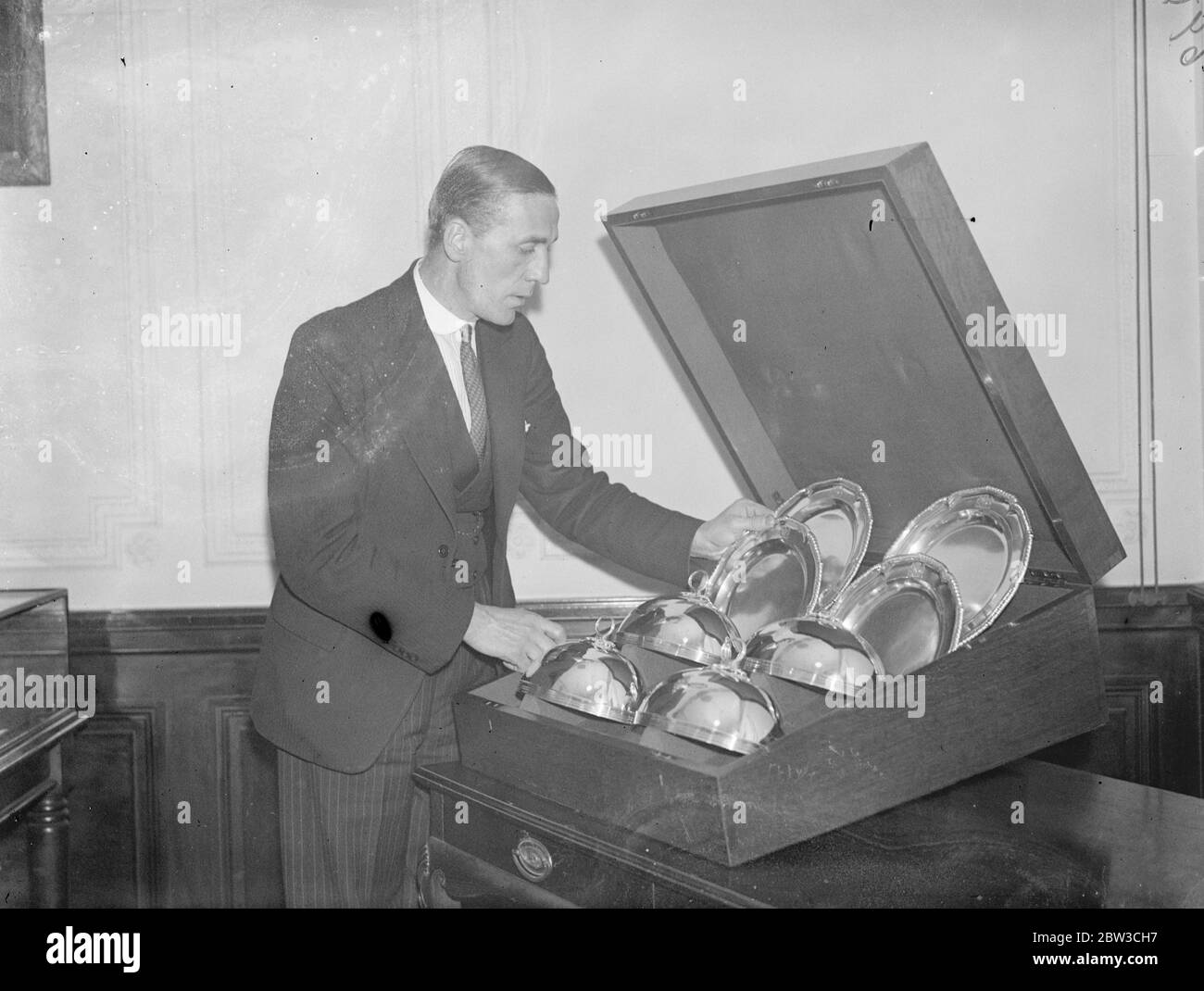 Serving dishes with their covers - wedding presents for the Duke of Kent and Princess Marina - the Royal couple . 22 November 1934 Stock Photo