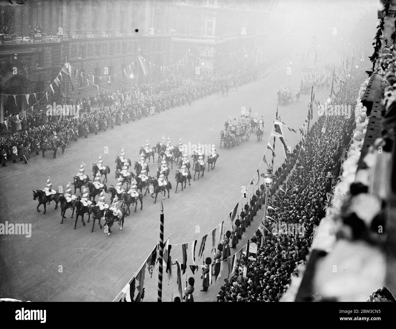 Royal wedding of the Duke of Kent and Princess Marina of Greece and Denmark . A view showing the procession of carriages and their cavalry escort of Horseguards . 28 November 1934 Stock Photo