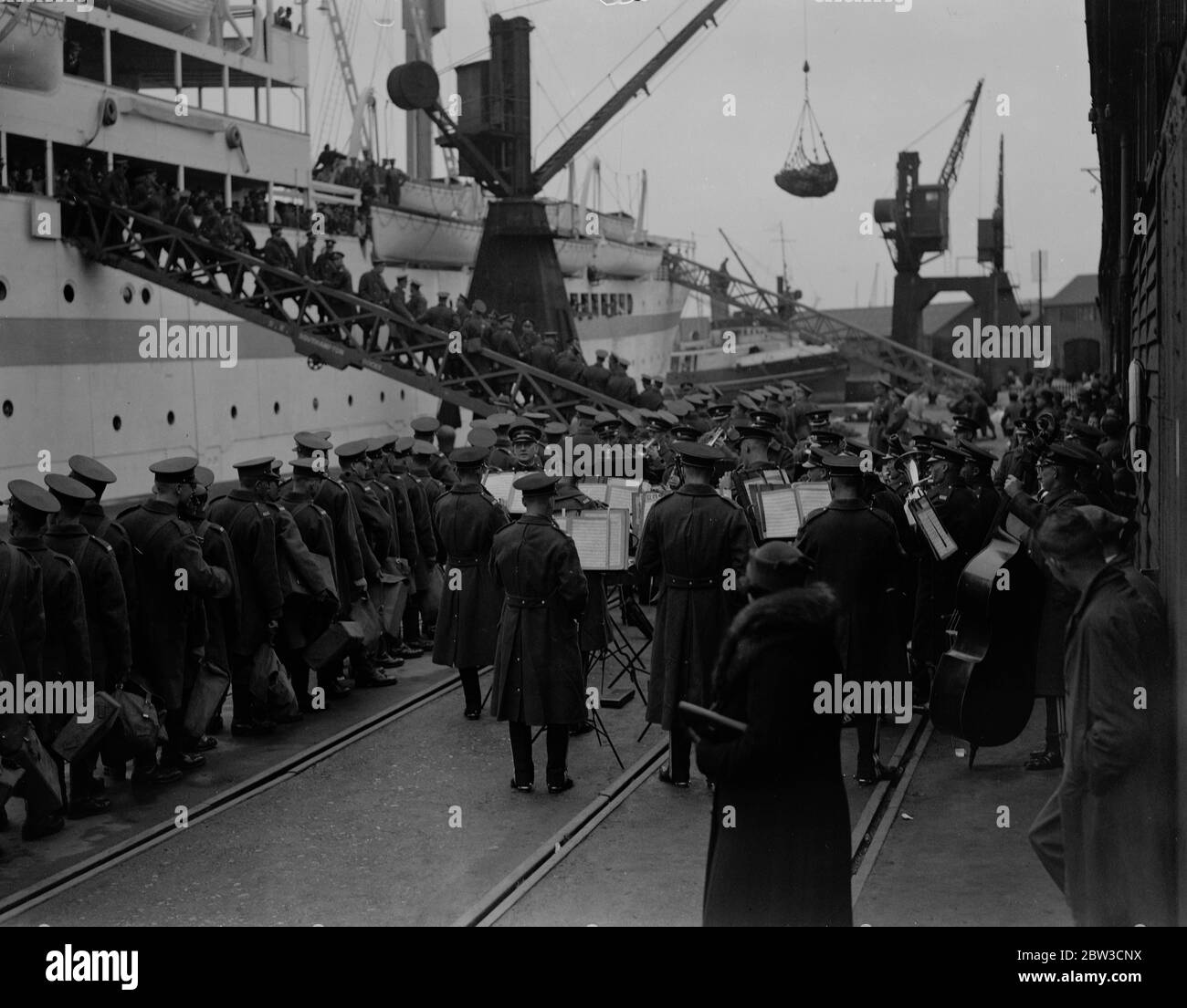 Musical send off . Men of RASC leave Southampton . The band of the Royal Army Service Corps playing the men aboard . 1 November 1935 Stock Photo