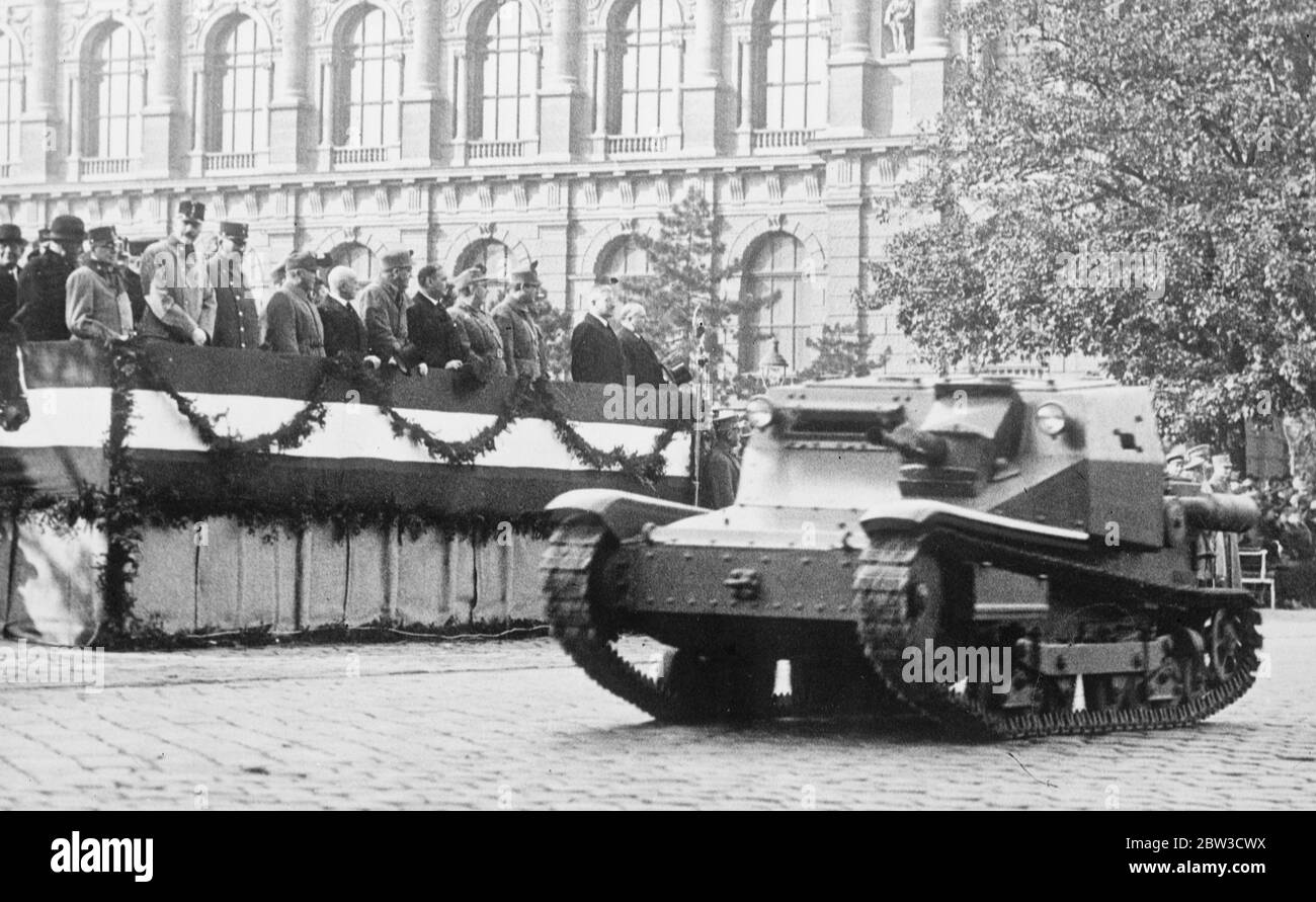 Prince Starhemberg , who may be regent . Watches Austria 's forbidden tanks of parade in Vienna . Members of the Austrian Government watching the parade of tanks . From right are President Miklas , Chancellor Schuschnigg , and Prince Starhemberg . 28 October 1935 Stock Photo