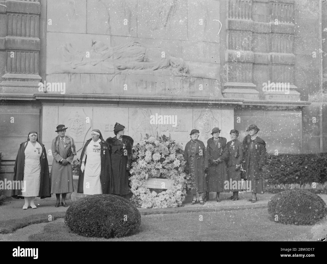Twentieth anniversary of Nurse Cavell 's execution commemorated in Paris . The scene at the ceremony . Left of the wreath is Madame Rodillon , President of the Association of Officers Widows and right , Mlle Louise Thuliez , who was condemned to death at the same time as Nurse Cavell . 12 October 1935 Stock Photo