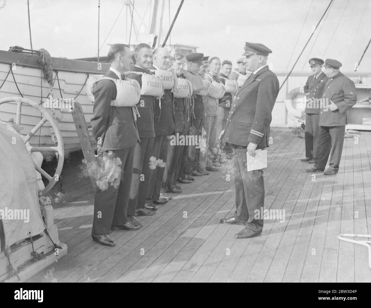 Final lifeboat inspection aboard Olympic as she leaves for Breakers Yards . The lifeboat muster and inspection aboard Olympic before she left Southampton for Jarrow . 11 October 1935 Stock Photo
