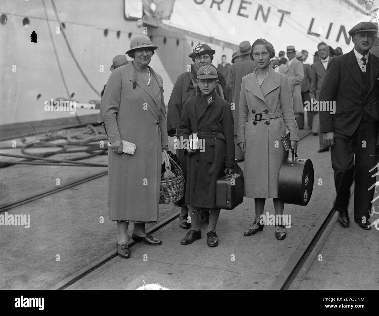 Five hundred passengers saved from the cruise liner Doric which collided with the French Steamer Formigny off the coast of Portugal , arrived at Tilbury on the Orient liner Orion which went to their rescue . Mrs Richard Buck with her daughter Mrs Perry and two children who were passengers on the Laurentic when it crashed less than a month ago , leaveing their second collision in less than a month . 7 September 1935 Stock Photo