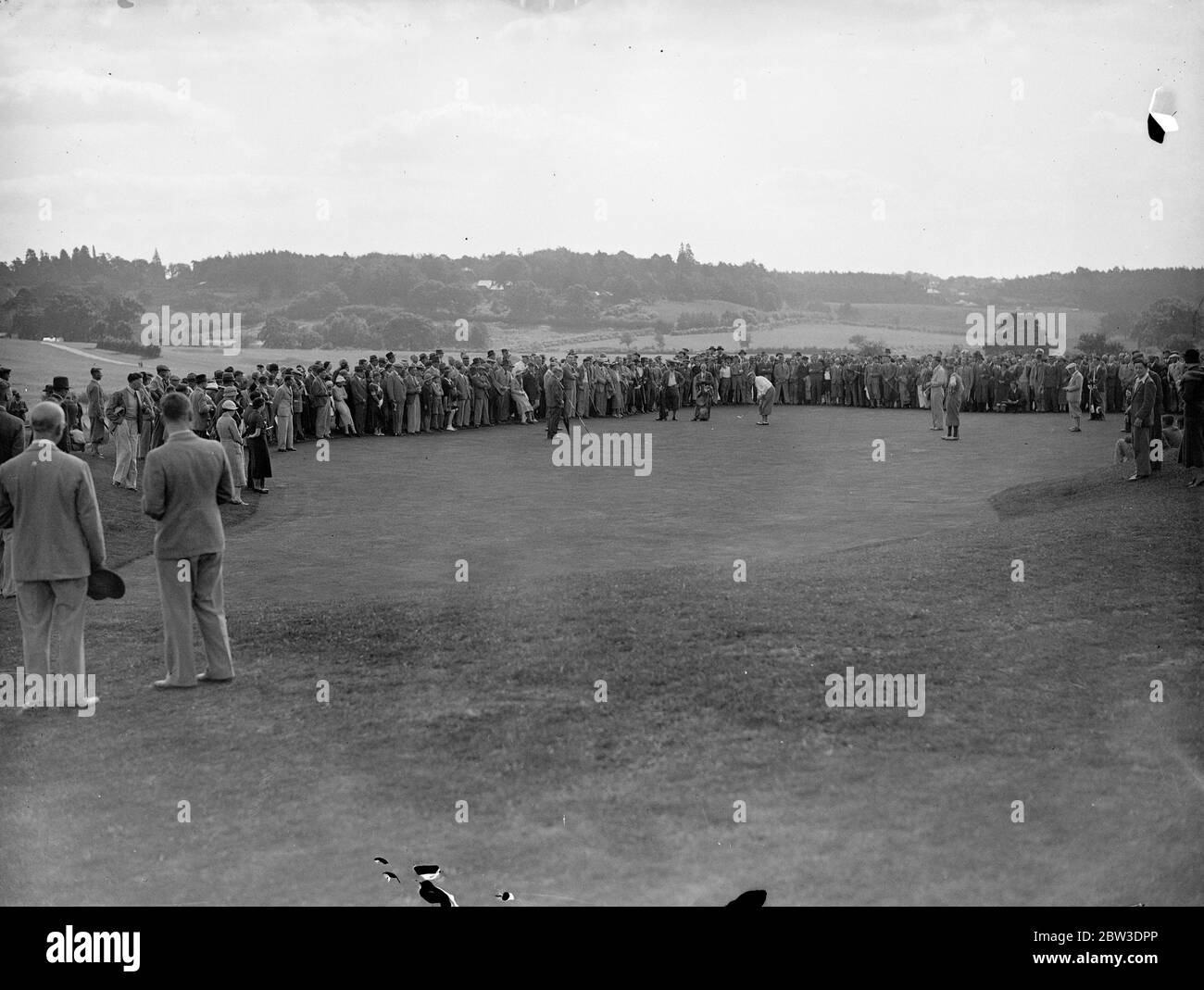 Famous golfers try out Southampton ' s new public course . Alfred Perry the British open champion , A H Padgham and C A WHitcombe captain of the British Ryder Cup team , played two four ball exhibition matches with F T Bowdrey , the newly appointed professional to the Southampton public golf course . Photo shows Alfred Perry putting . 7 September 1935 Stock Photo