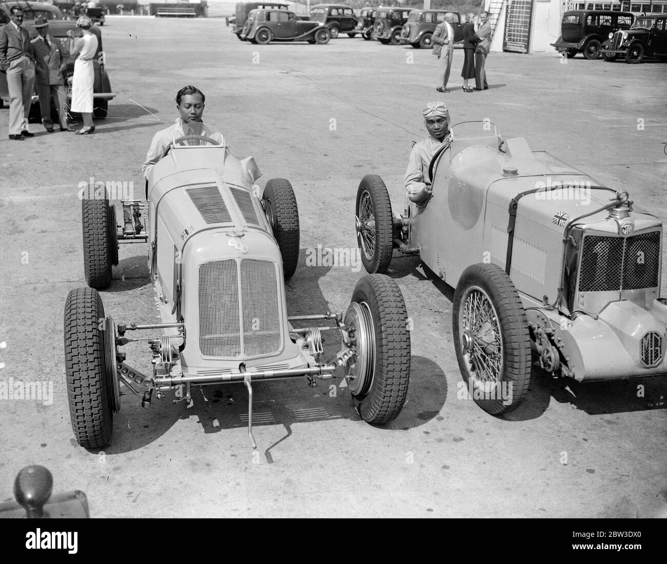 Siam ' s Princes to race at Brooklands . Two Princes ' s from the Royal House of Siam , Prince Bire and Prince Abhbs , his brother are to race for a trophy presented by Prince Chula of Siam . Photos shows Prince Rizobongs ( leftt ) in his M G and Prince Abbss in the R H A . 31 July 1935 Stock Photo