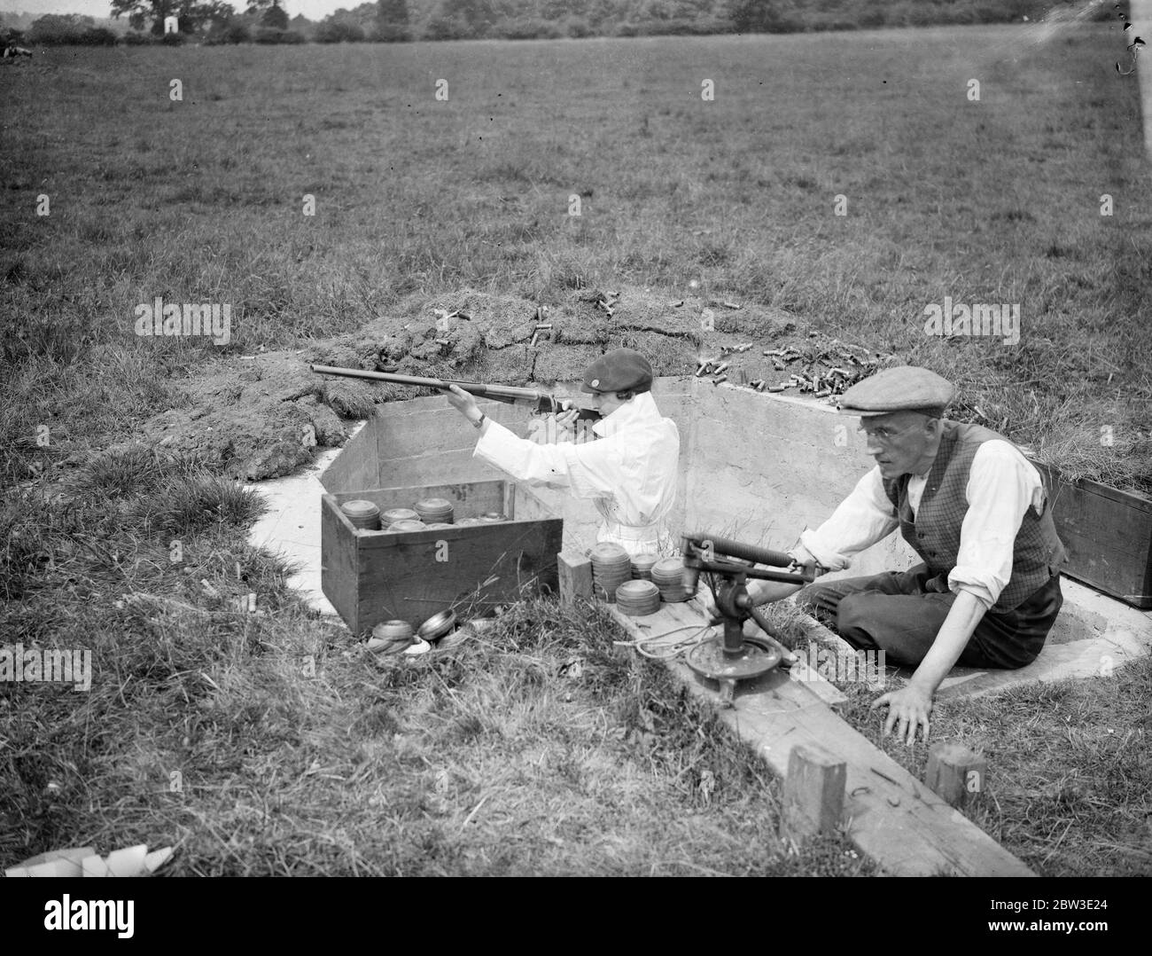 Women marksmen compete at Greenford . Large women ' s entry in the clay pigeon shooting