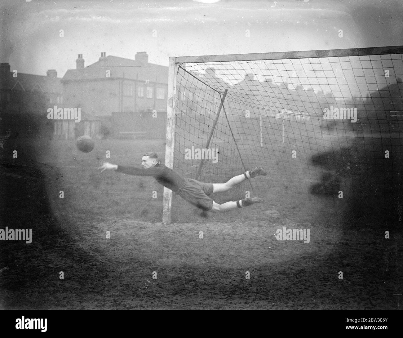 Percy Hooper , Spurs new 6' goalkeeper , tries his practice at White Hart Lane . 8 January 1935 Stock Photo