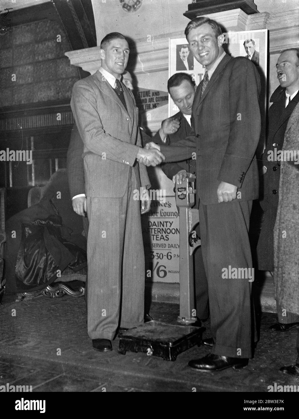 Jack Peterson and Walter Neusel weigh in Empire Pool , Wembley, London, United Kingdom. 4 February 1935 Stock Photo