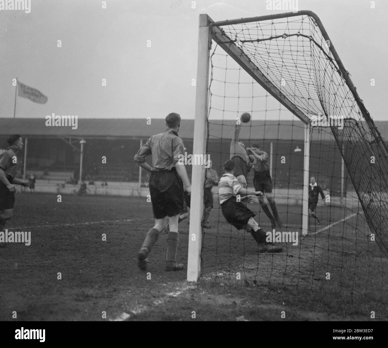 Norman Wharton makes spectacular save at Lea Bridge . Clapton Oriant met Norwich City in a Southern League match at the Lea Bridge Road ground . A spectacular save by Wharton , Norwich City goalkeeper . 11 February 1935 Stock Photo