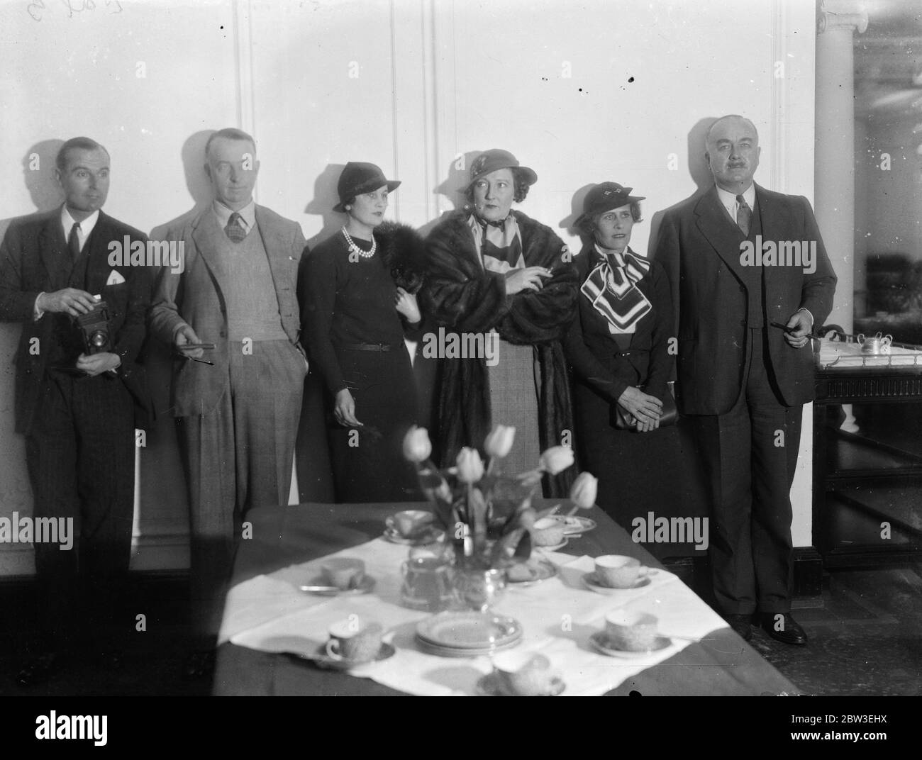 Passengers aboard the liner  RMS Arundel Castle  include , from left to right ; Capt A C Wilson , Mr TOM ( Tommy ) Sopwith , unknown , Mrs Sopwith , Mr and Mrs W M Bruster . 28 December 1934 Stock Photo