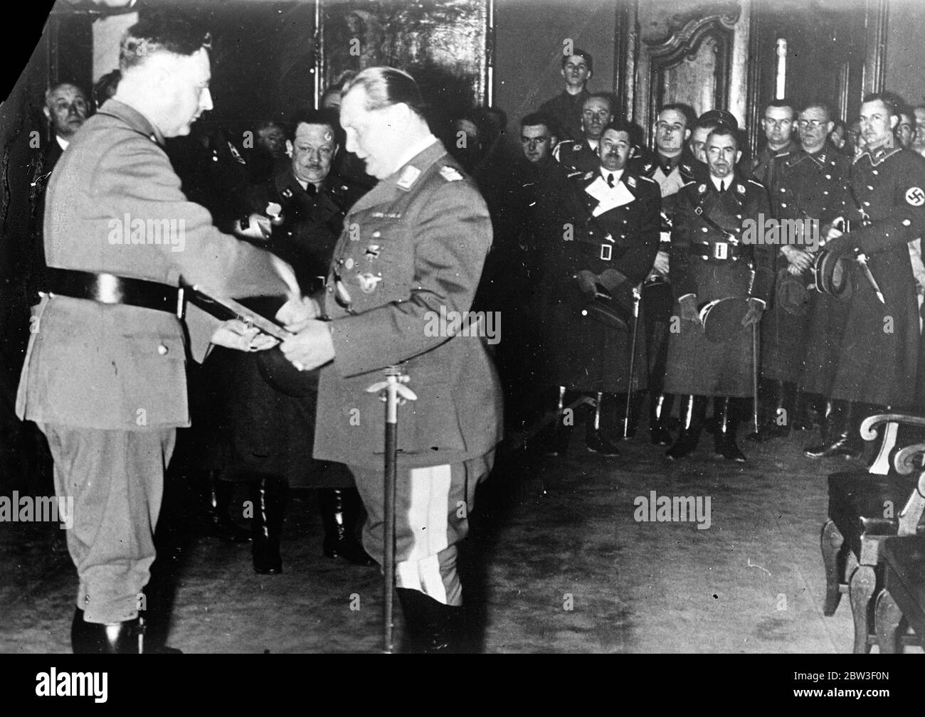 General Goering made honorary citizen when he opens election campaign in Koenigsberg . General Goering , the Prussian Premier , was made an honorary citizen of Koenigsberg when he visited the town to open his election campaign . In his speech , General Goering said that Germany ' s military forces are now strong enough to ward off invasion . Photo shows , General Goering receiving the documents which made him an honorary citizen of Koenigsberg . 14 March 1936 Stock Photo