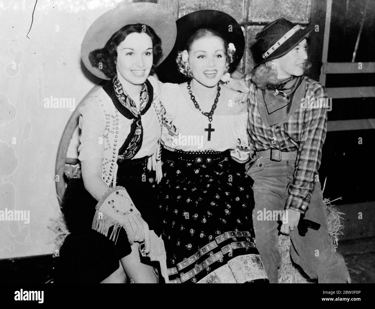 Ginger Rogers at a barn dance in Hollywood given by Grace Bradley . Left to right - Gail Patrick , Grace Bradley and Ginger Rogers at the party . 20 December 1935 Stock Photo