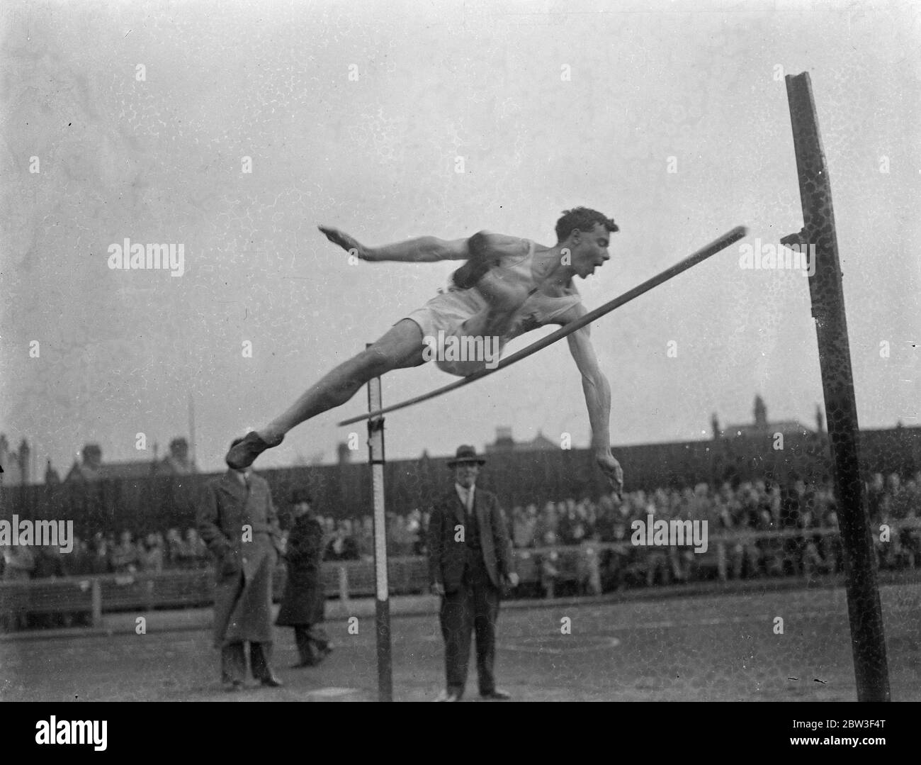 Hugh Jump disaster at Cambridge University sports . The Cambridge University sports were held on University Ground ( Fenner ' s ) at Cambridge . Photo shows , I L Roney Dougal ( Wellington R M A and Magdalene ) dislodges the stick in the high jump final . 7 March 1936 Stock Photo
