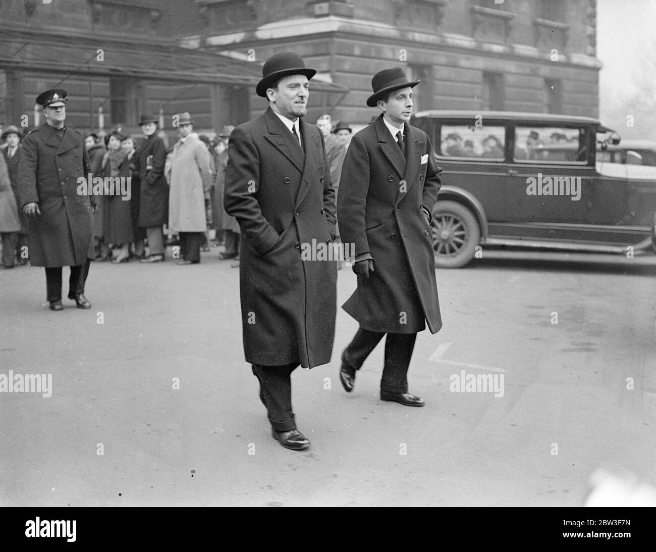 Signor Grandi leaves after Locarno meeting . After deliberating for several hours , the delegates of the Four Locarno Powers , Britian , Belgium , France and Italy , left the Foreign Office in Whitehall . Photo shows , Signor Grandi , Italian Ambassador , leaving after ther meeting . 12 March 1936 Stock Photo