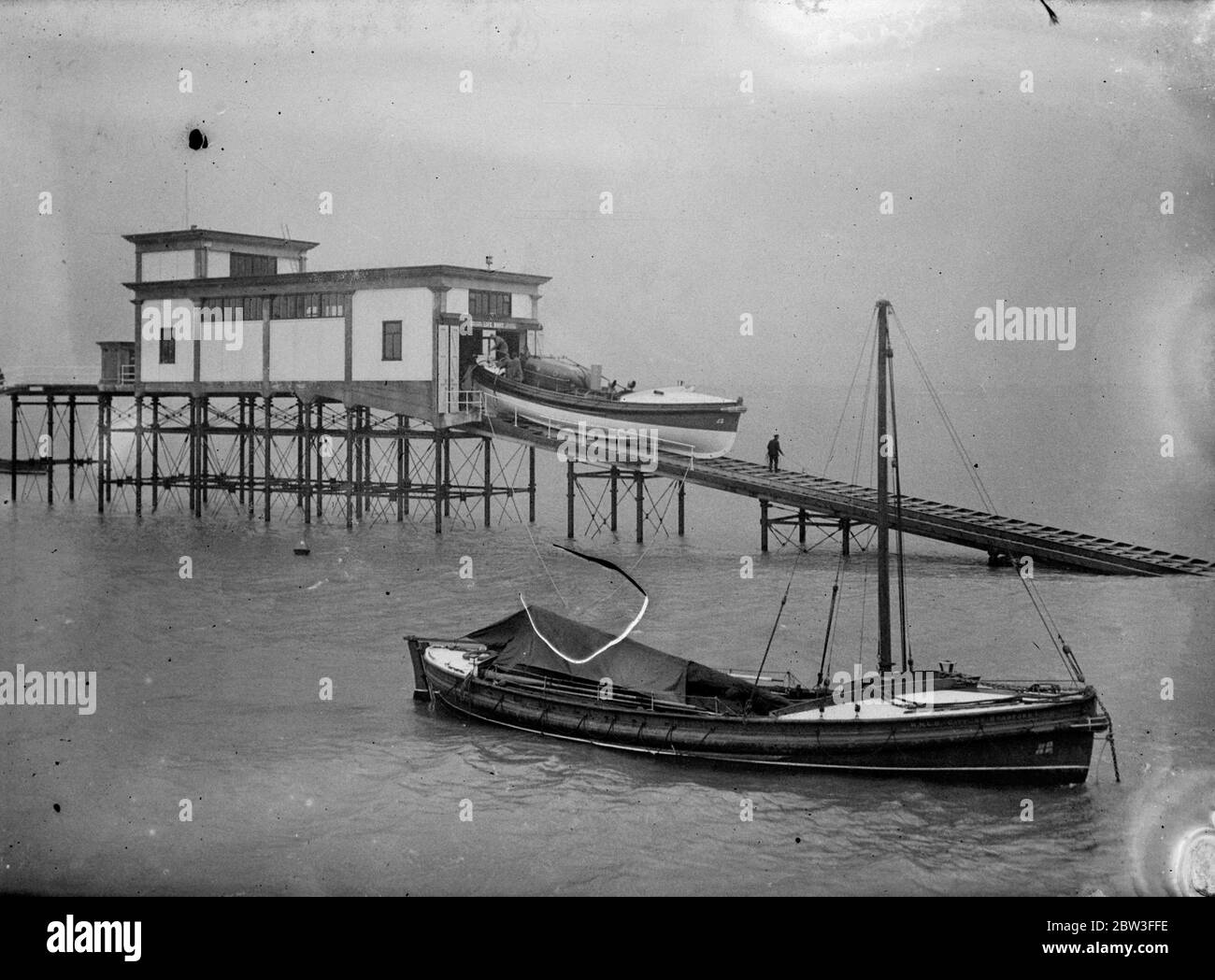 Southend ' s new lifeboat slipway tested for first time . Photo shows ; The Greater London Southend ' s lifeboat launching . 25 January 1935 Stock Photo