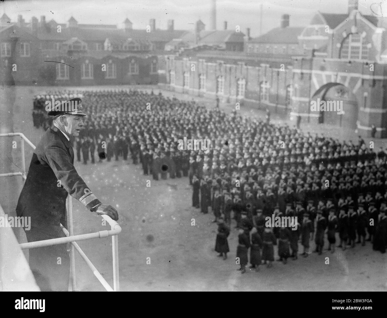 Commodore of Royal Naval barracks says ' goodbye ' at Chatham . Rear Admiral R C Davenport said goodbye at the Royal Naval barracks at Chatham , after two years as Commodore . He made a farewell speech on the parade ground and then took the salute at the march past . 29 January 1935 Stock Photo