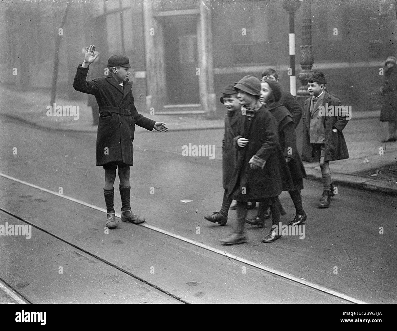 Boy traffic police appointed by North London school . 29 January 1935 Stock Photo