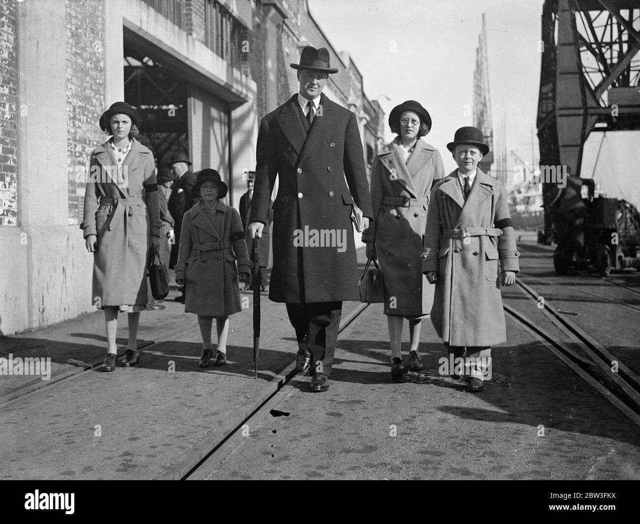 Duke of Marlborough arrives home with children . The Duke of Marlborough photographed with his children on arrival at Southampton . 24 March 1935 Stock Photo