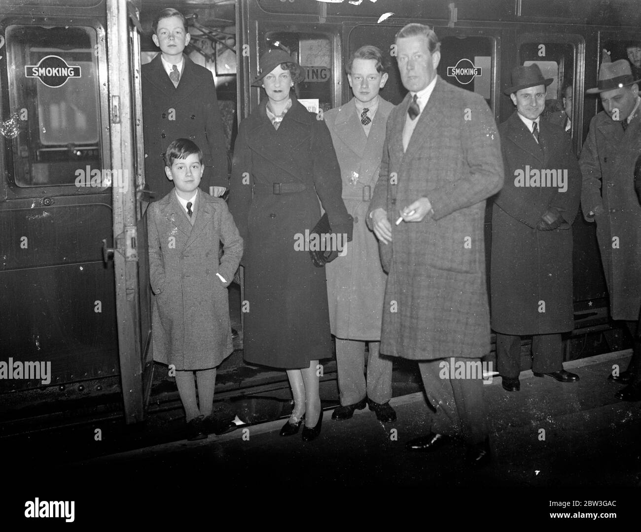 Sir Victor Warrender , MP , Lady Warrender and their three children left Victoria Station , London for France where they are going on a month ' s cycling tour , starting from Avignon . Sir Victor and Lady Warrender have three sons aged 15 , 14 , and 8 . Sir Victor is MP for Grantham and is Financial Secretary to the War Office . Photo shows , Sir Victor Warrender , MP with Lady Warrender and their three sons on departure from Victoria . 8 April 1936 Stock Photo