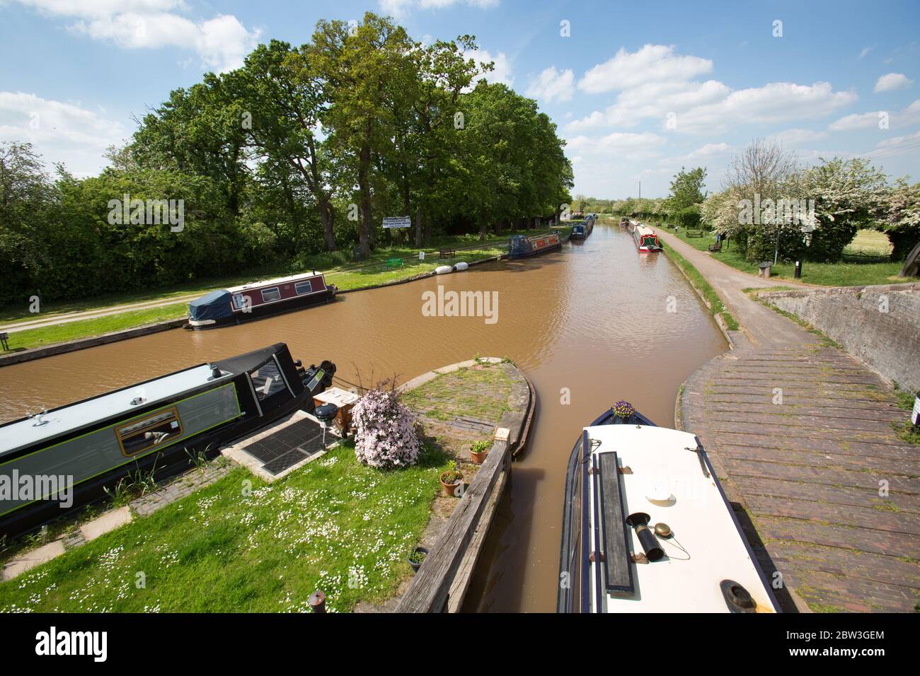 Shropshire Union Canal, Cheshire, England.  Picturesque view of a canal boat transiting the Shropshire Union Canal, at the Nantwich Canal Centre. Stock Photo