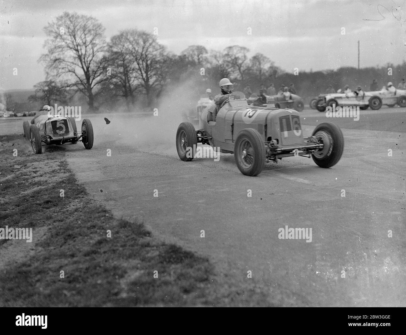 Seaman driving single handed , wins British Empire road race . Driving witout relief for the whole 250 miles of the course , R J B Seaman ( Maserati ) won the British Empire trophy race , the first big car race of the season at Donington Park , Derby . He averaged 66.33 miles per hour . P S Fairfield ( E F A ) was second and W C Everitt ( Alfa Romeo ) was third . Twenty seven of Britain ' s finest drivers competed in the event . Photo shows , Prince Bira of Siam driving and ERA ( No 16 ) leading during the race closely followed by Wal Handley driving a Riley ( No 5 ) . Handley crashed shortly Stock Photo