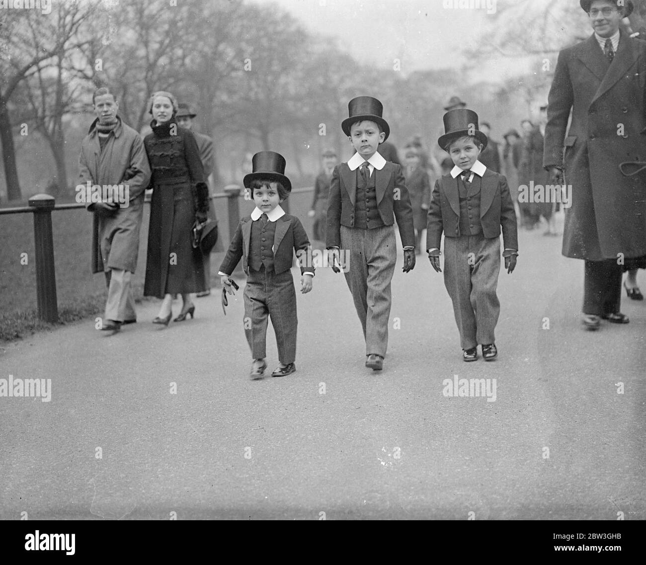 Hardy men  in the park . The three small sons of Dr O Aguilar , Chancellor of the Venezuelan Legation in London , walking in the Palm Sunday Church parade in the park . 5 April 1935 Stock Photo