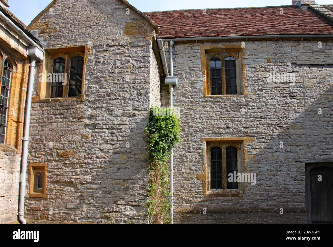 Windows and old stone walling in an English Manor House Stock Photo - Alamy