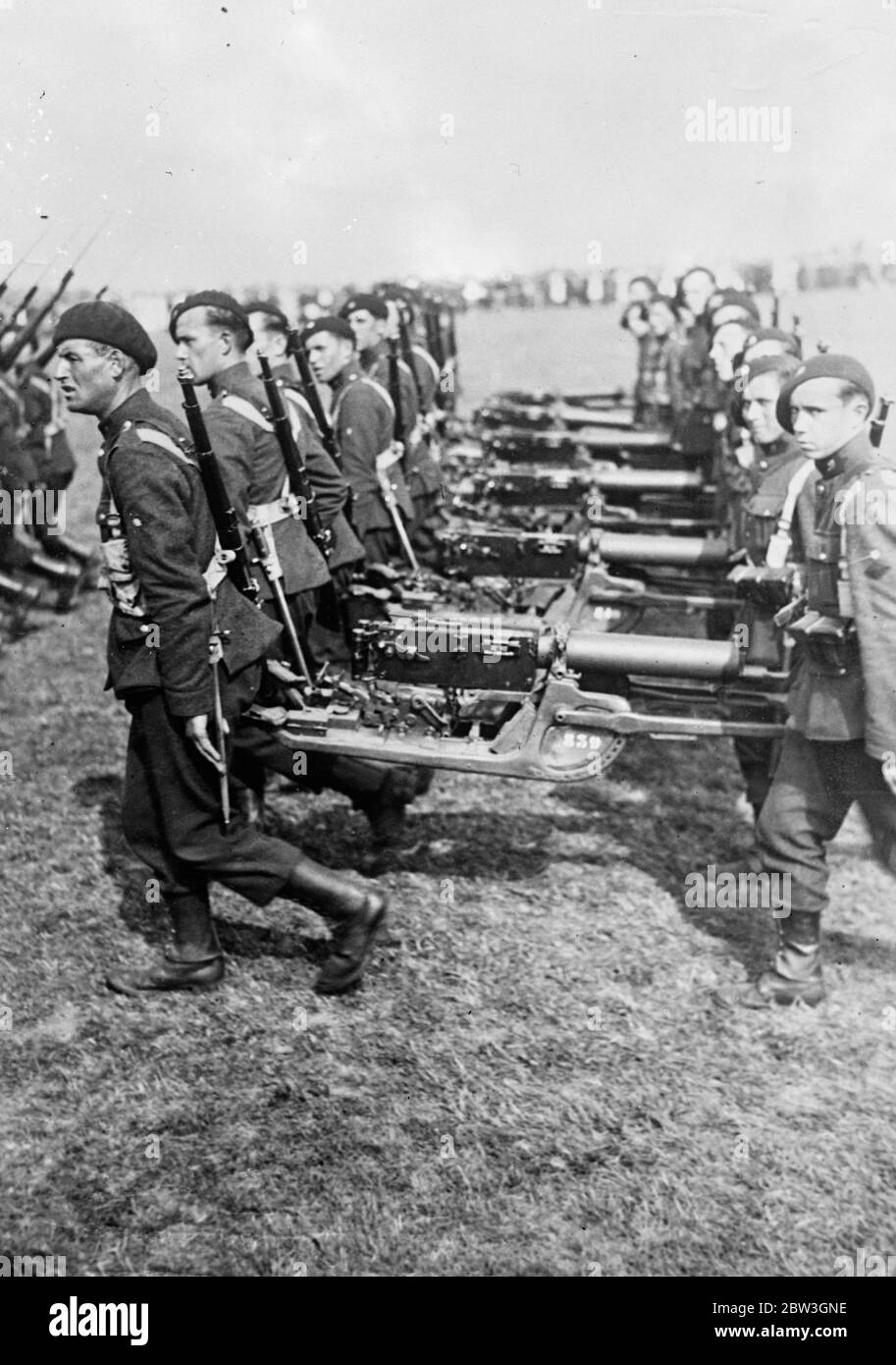 Belgium masses troops on frontier as Germany enters League deliberations . Belgian machine gun detachments during exercises near the eastern frontier . 18 March 1935 Stock Photo