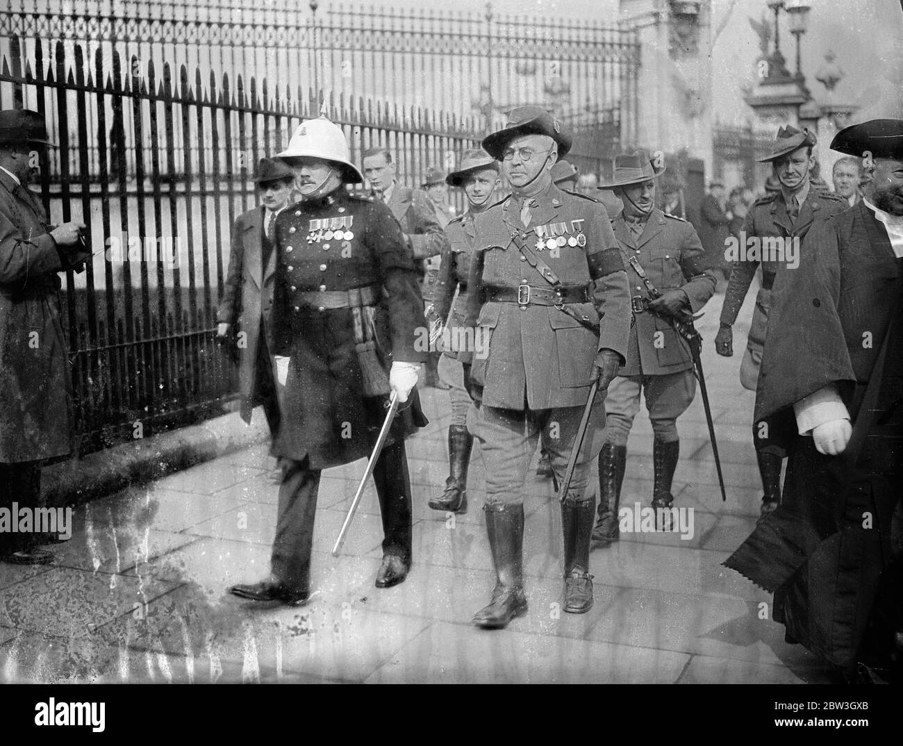 Australian officers at Buckingham Palace levee . For only the third time in 50 years a Levee was held at Buckingham Palace . The levee council is meeting at St James Palace , the King decided to hold the Levee at Buckingham Palace instead . Photo shows , Lieut Col E K Smart , Australian Staff Corps and Colonel P E G Leary of the Australian Medical Staff , leaving after the Levee . 18 March 1936 Stock Photo