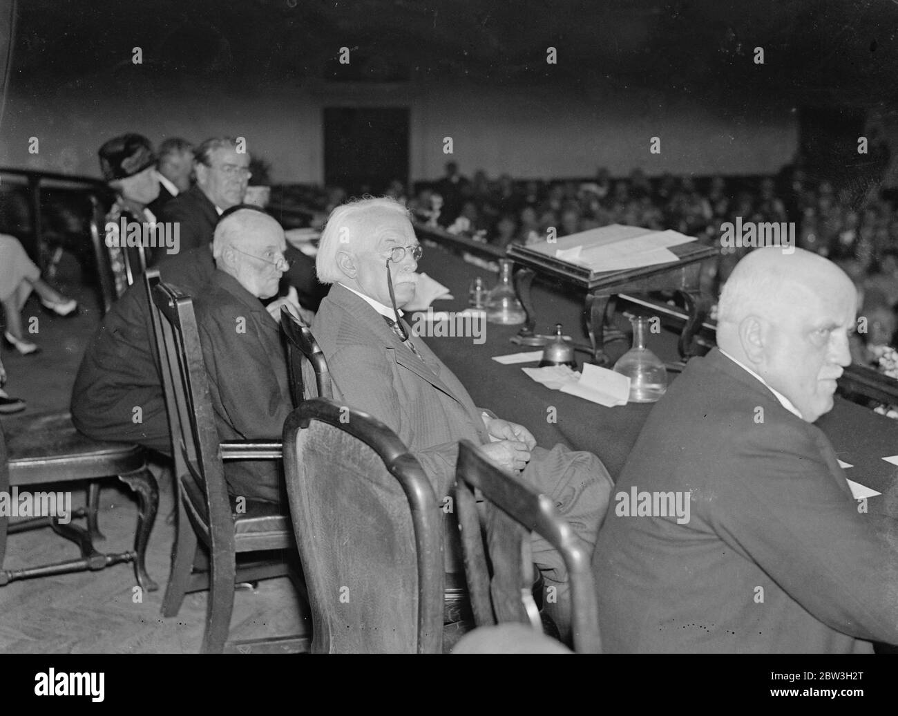 David Lloyd George and Lord Cecil at peace and reconstruction convention at Central Hall . Photo shows , Lloyd George and Dr Scott Lidgett listening intently to an address at the convention . 1 July 1935 Stock Photo