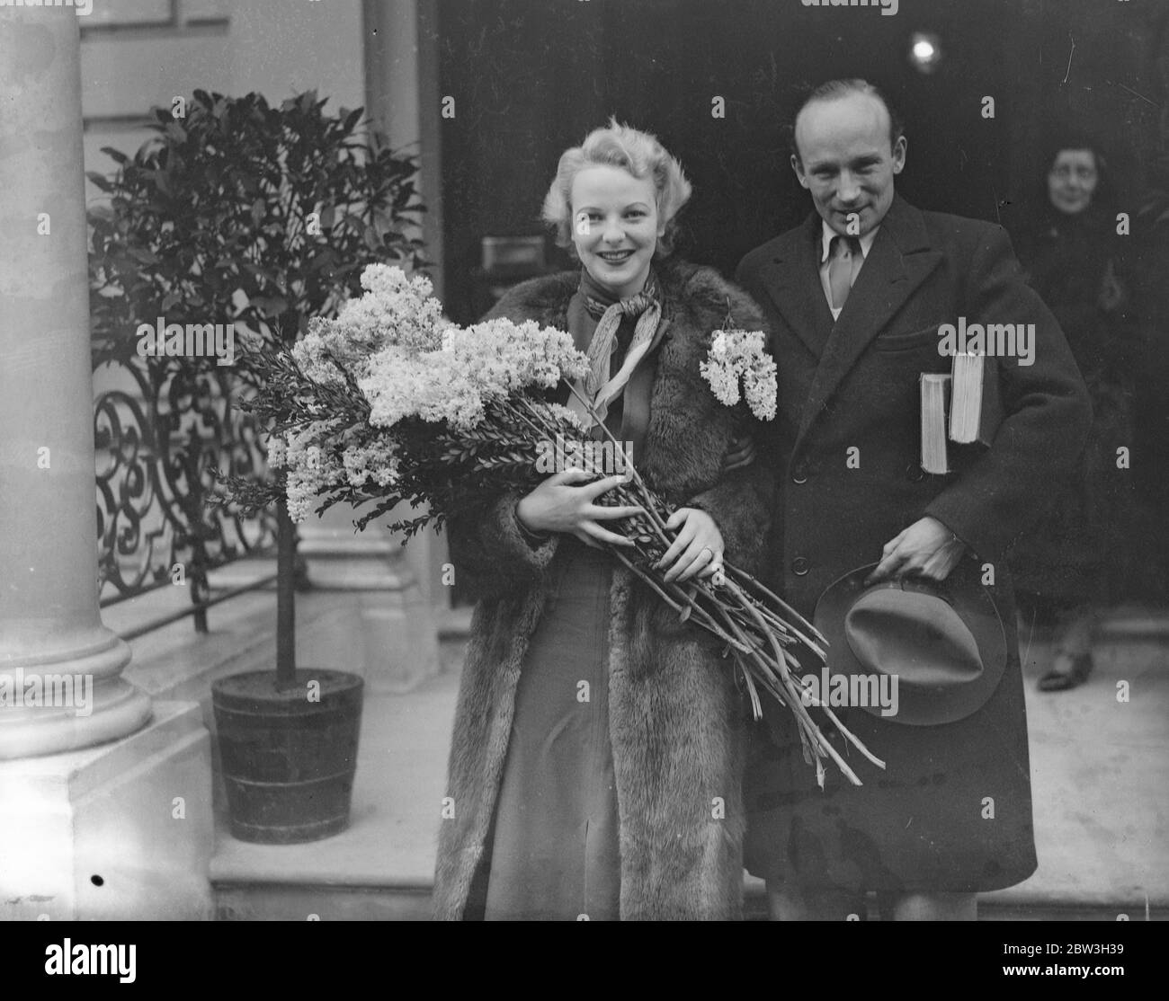 Film actress and husband leave nursing home where they spent their honeymoon . Miss Anna Lee and her husband , Mr Robert Stevenson , leaving the nursing home , London . 7 February 1935 Stock Photo