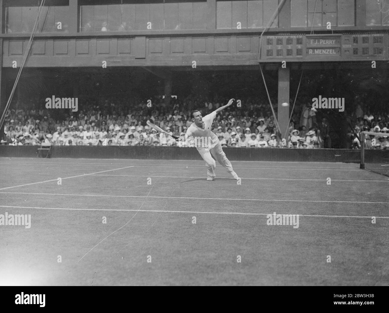 Fred Perry in play in the mens singles quarter final at the Wimbledon  Championships . 1 July 1934 Stock Photo - Alamy