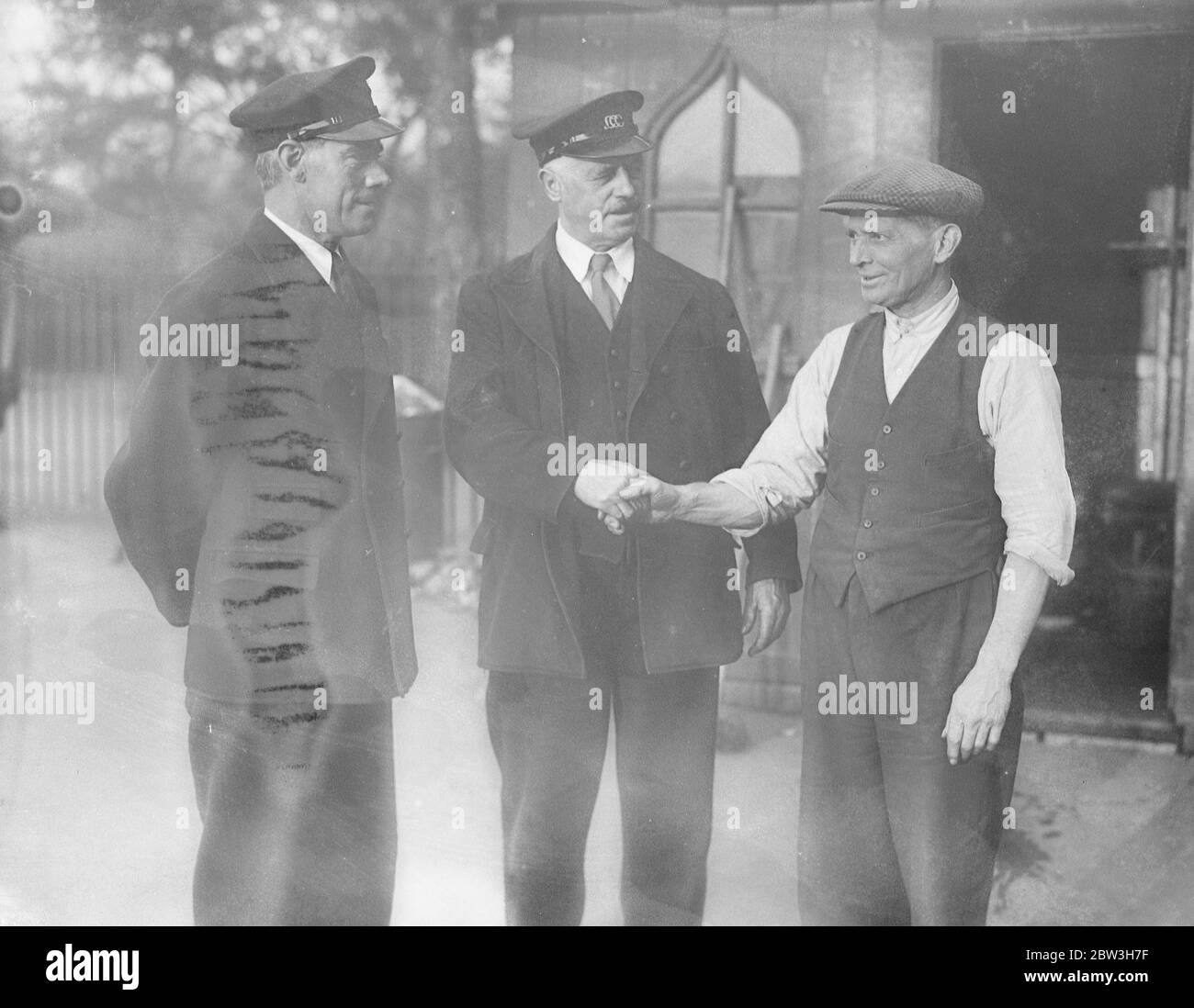 London boatman retiring after 46 years . Mr Charlie Potter being congratulated by fellow workmen on his retirement . 26 October 1935 Stock Photo