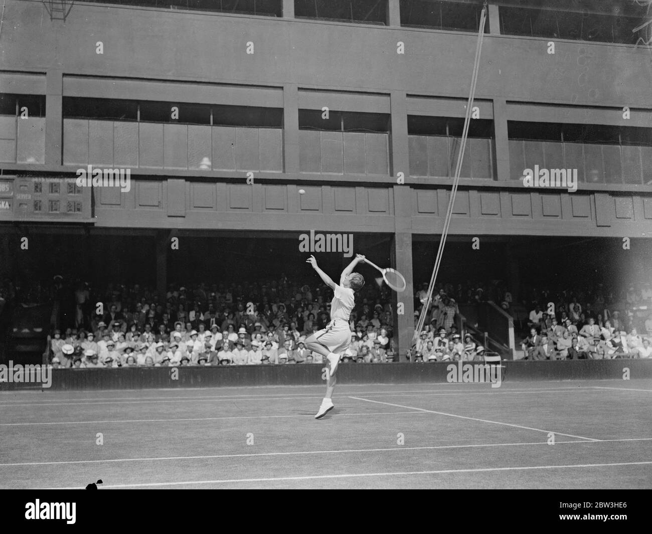 Helen Jacobs in play in the ladies singles at the Wimbledon Lawn Tennis Championships . 2 July 1935 Stock Photo