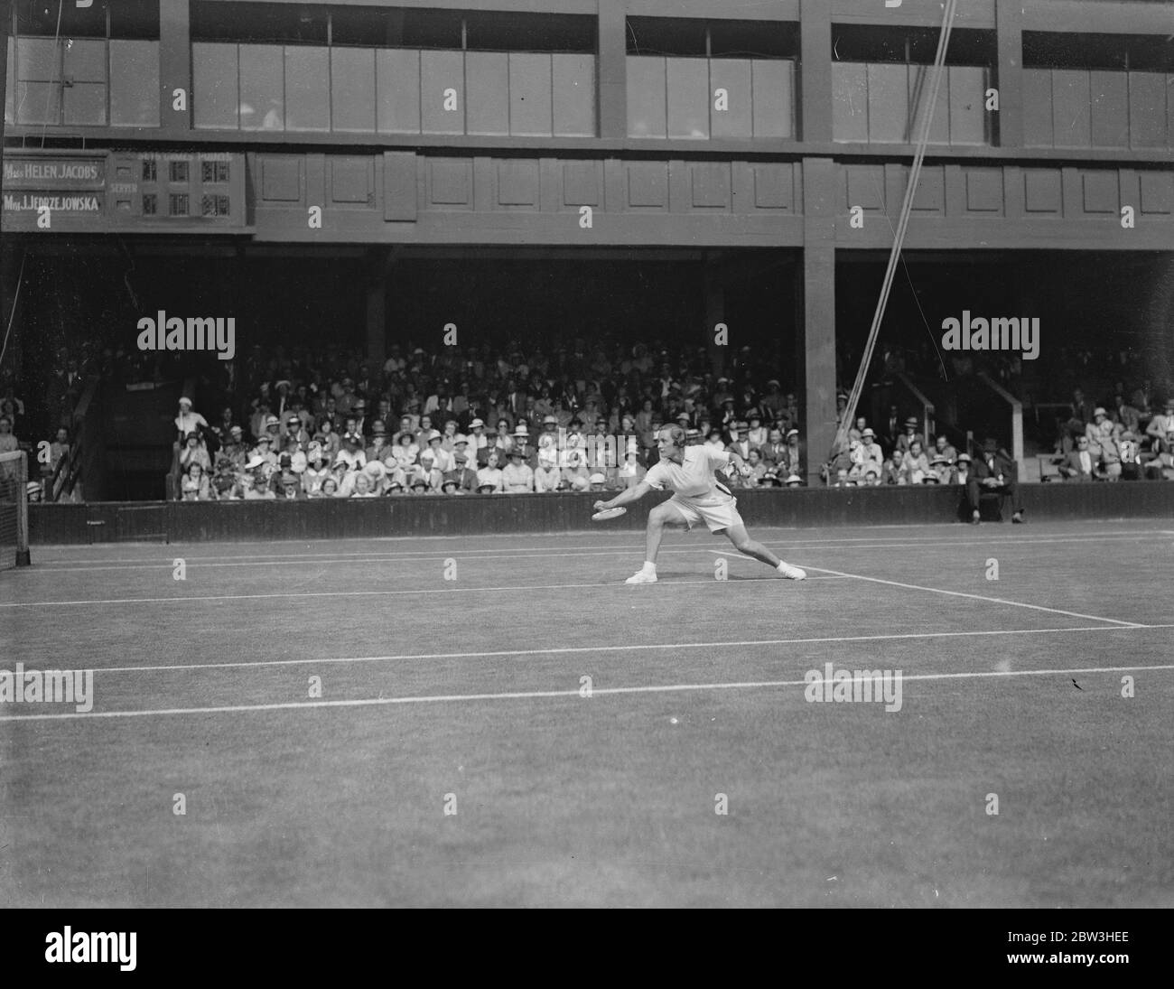 Helen Jacobs in play in the ladies singles at the Wimbledon Lawn Tennis Championships . 2 July 1935 Stock Photo