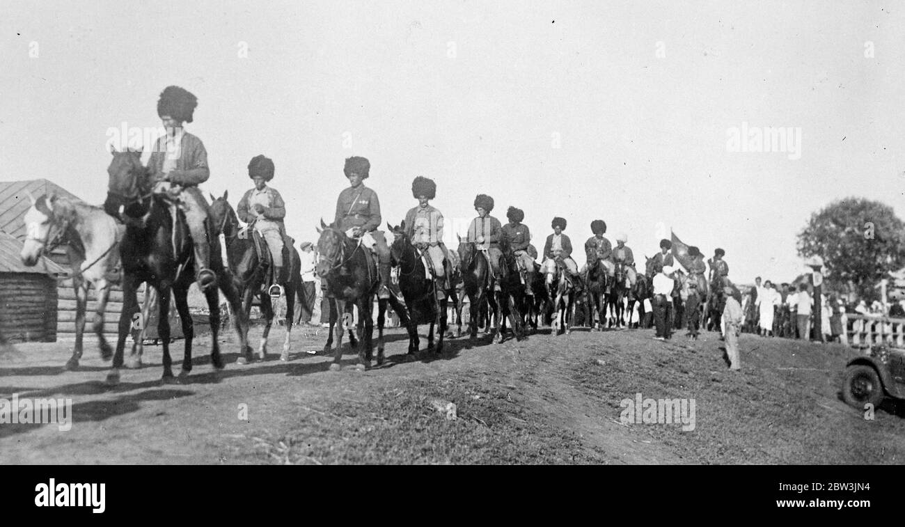 Twenty eight Turkomen riders are travelling 4 , 000 miles from Ashhabad ( Turkmenistan ) to Moscow on horseback . Photo shows , the Turkomen horsemen riding through the Kubyshev territory , ( Lower Volga ) . 11 August 1935 Stock Photo