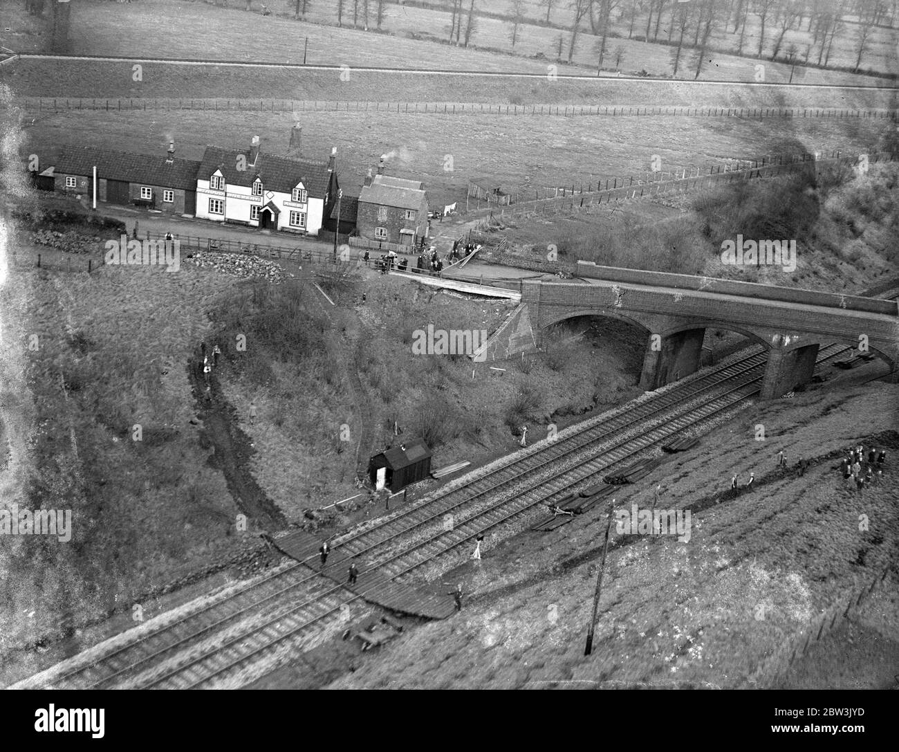 Devizes bridge collapsing through heavy rains . Great cracks in roadway ...