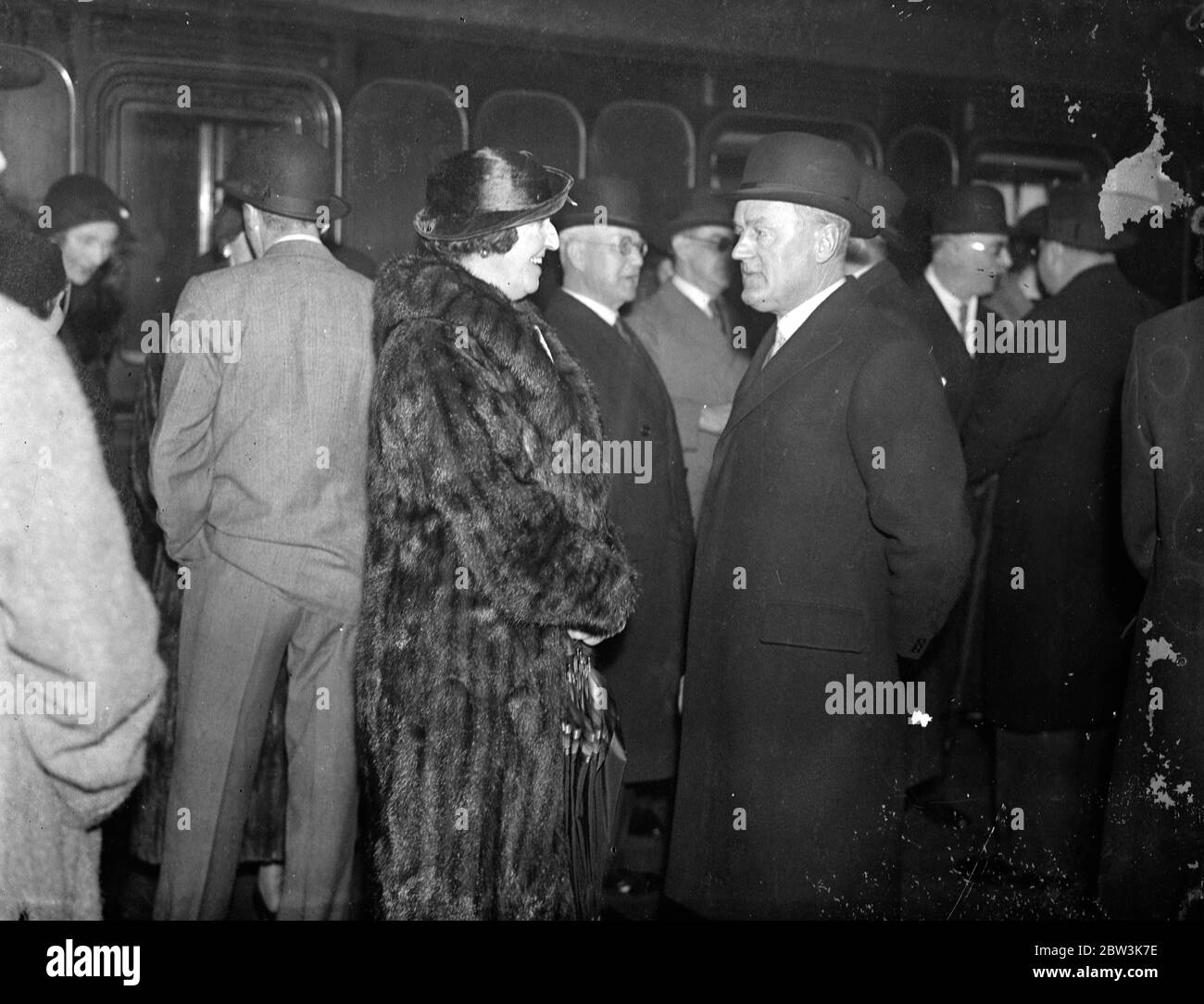 New Governor of Newfoundland leaves to take up his appointment . Vice Admiral Sir Humphrey Welwyn talking to a friend before leaving Euston . 9 January 1936 Stock Photo